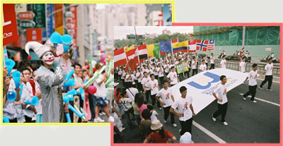 世運會旗從杜伊斯堡迎回時，還特別舉辦了「世運迎旗大遊行」，各界歡喜參與，許多民眾夾道歡迎。(圖/鮑忠暉攝)